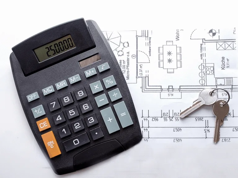 Blog 12 A calculator and house keys resting on architectural plans — Understanding Direct and Indirect Costs in Construction Projects article
